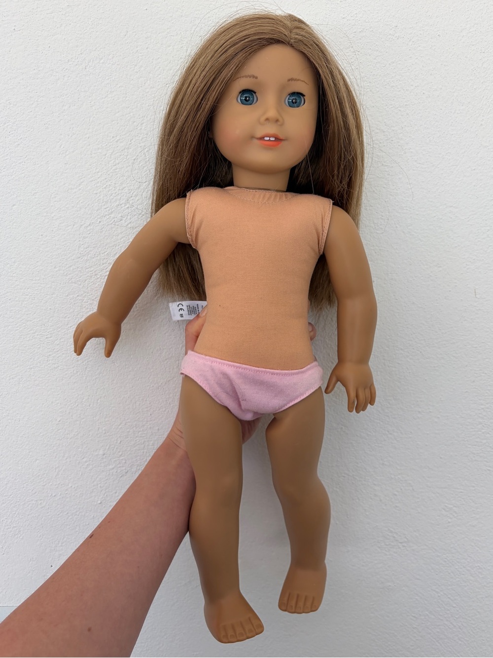American Girl Doll with Brown Hair and Blue Eyes